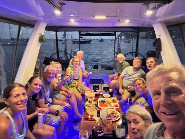 Friends standing together on a tropical trail