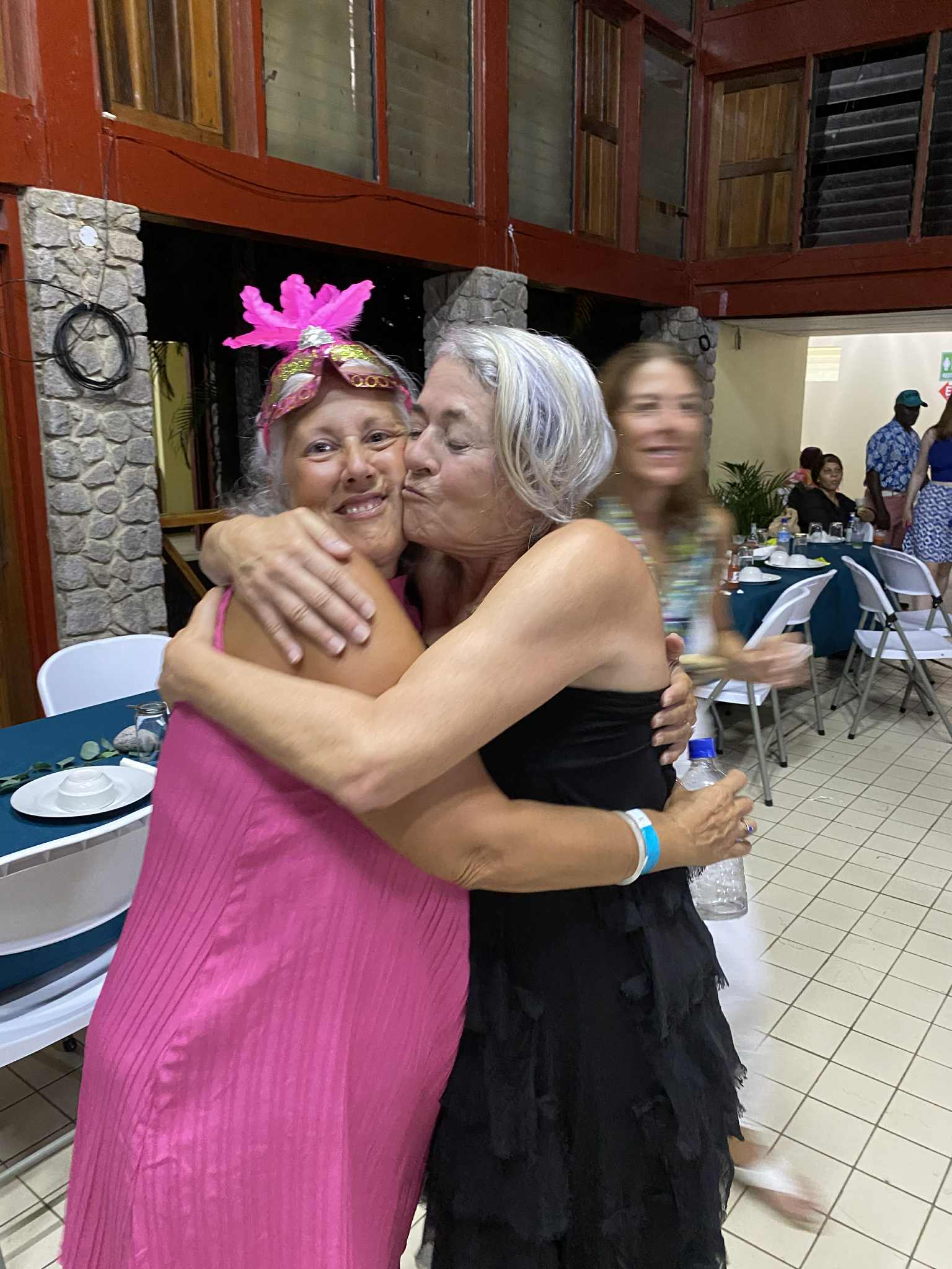 Friends hugging at a festive party