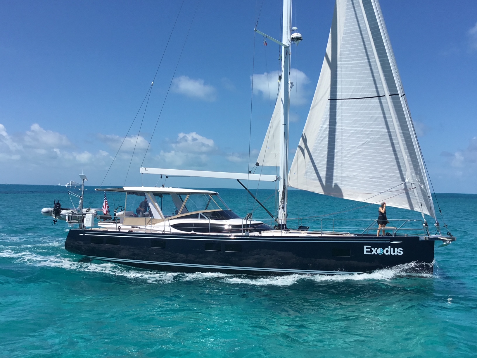 Exodus sailing in bright turquoise water