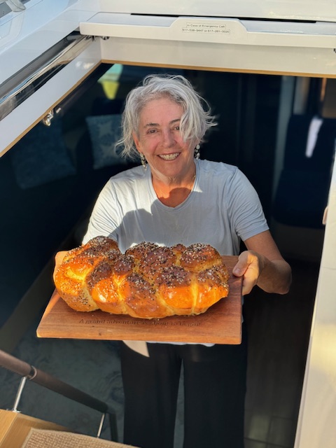 Fresh baked bread being carried up from below deck